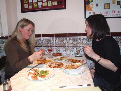 Two friends enjoy a catch-up over a relaxing meal at Casa Lola