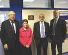 Standing by the plaque commemorating the opening of the new classroom, from left: Jim Burton, President of Caterham Rotary Club; Caroline Longhurst, the incoming Head of de Stafford; Mark Phillips, Head teacher at de Stafford and Bill Ridley of Caterham Rotary Club.