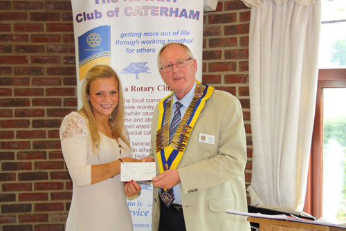 Caterham Rotary President, Mike Smith, presents Kay Wilson with her cheque for £250 