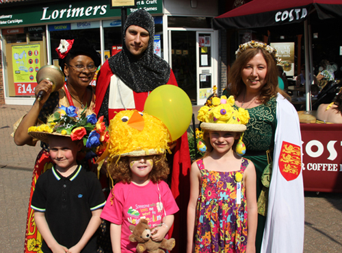 The Easter Bonnet competition winners with Sonia Hunt the Town Crier,  St. George and Centre Manager, Shelley Filippi. Photograph by Jon Harrison, www.localeventphotos.co.uk 