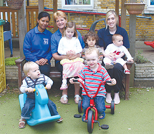 Staff and children from the 'Outstanding' Little Treasures nursery.