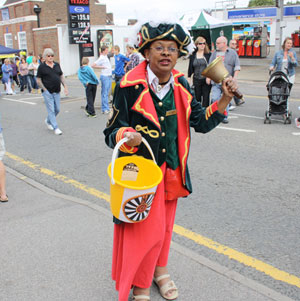 Caterham Town Crier, Sonia Hunt heralds the start of the Caterham Festival Street Party 2011.