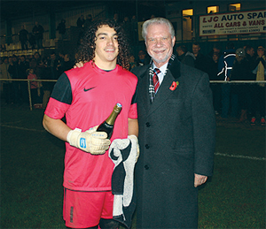 Whyteleafe FC Man of the Match, Ricky Borrett with West Ham United chairman, David Gold.