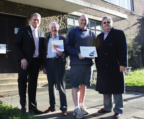 Supporters of Superfast Broadband in Caterham outside the BT Exchange in Godstone Road, from left, Simon Flatt, Chris Windridge, Andy Parr and Graham Tapley.