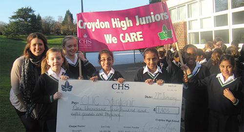 The girls from Croydon High with their cheque for Clic Sergeant.