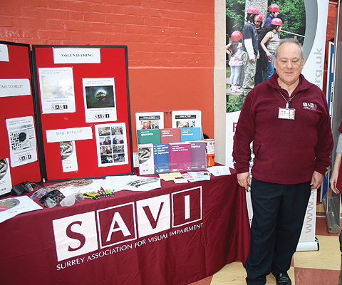 The SAVI (Surrey Association for Visual Impairment) stand at the Tandridge Volunteer Fair. Pictured are Volunteer Co-ordinator Dennis Saunders and Fundraising Administrator, Lex Daniel.