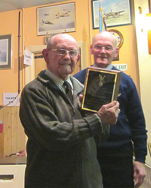 Ken Sayers and his engraved plaque with Branch Chairman, Mike Roach at the Portcullis Club in Kenley.