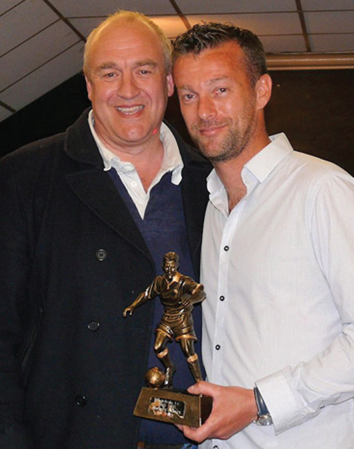 Ian Selley receiving his Player of the Season award from manager Steve Griffin.